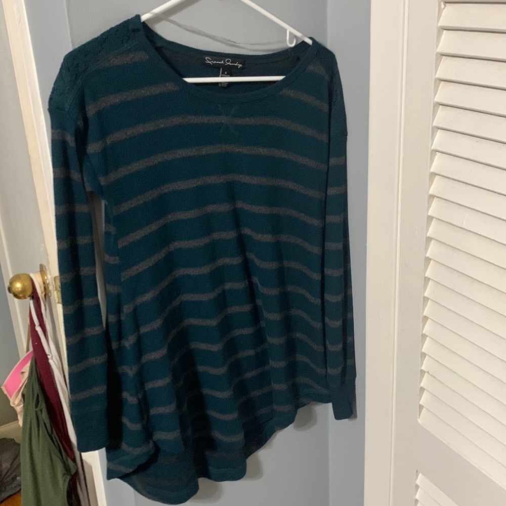 Women’s small long sleeve with lace shoulder shirt. Preowned but great condition